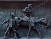 Don Quijote y Sancho en la placa conmemorativa de la Sociedad Cervantina